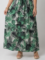 Detail of the Maravelle dress flowing palm print skirt