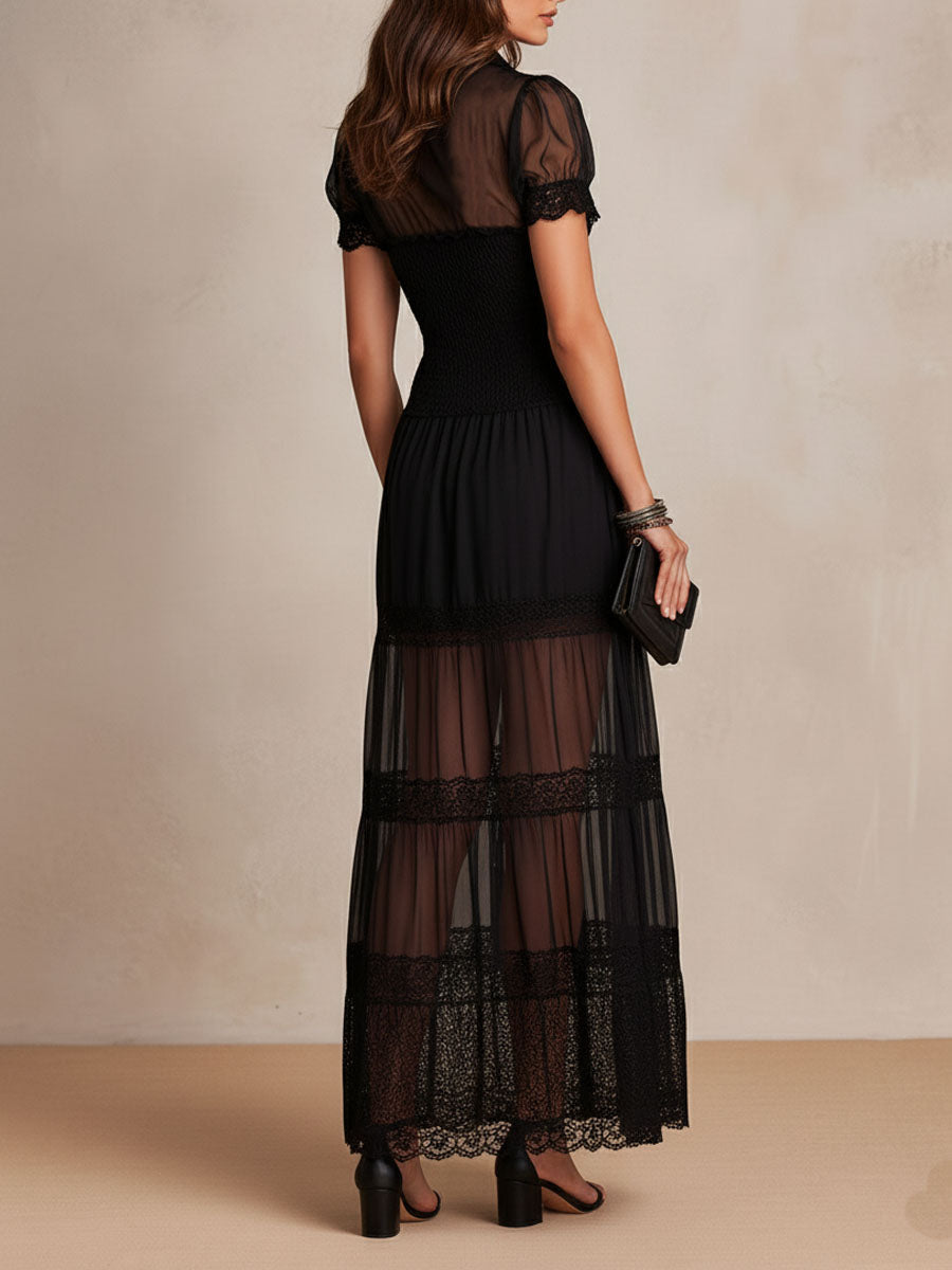 Gillian - Sheer Lace Maxi Dress, back view showing the sheer skirt