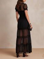 Gillian - Sheer Lace Maxi Dress, back view showing the sheer skirt