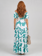 Orelina maxi dress detail with cut-out waist and tiered skirt