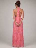 Detail of pleated flowing skirt in pink print