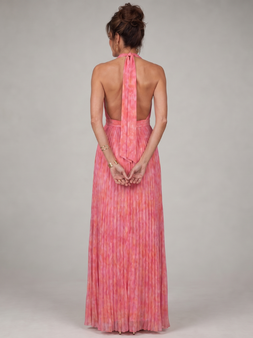 Detail of pleated flowing skirt in pink print