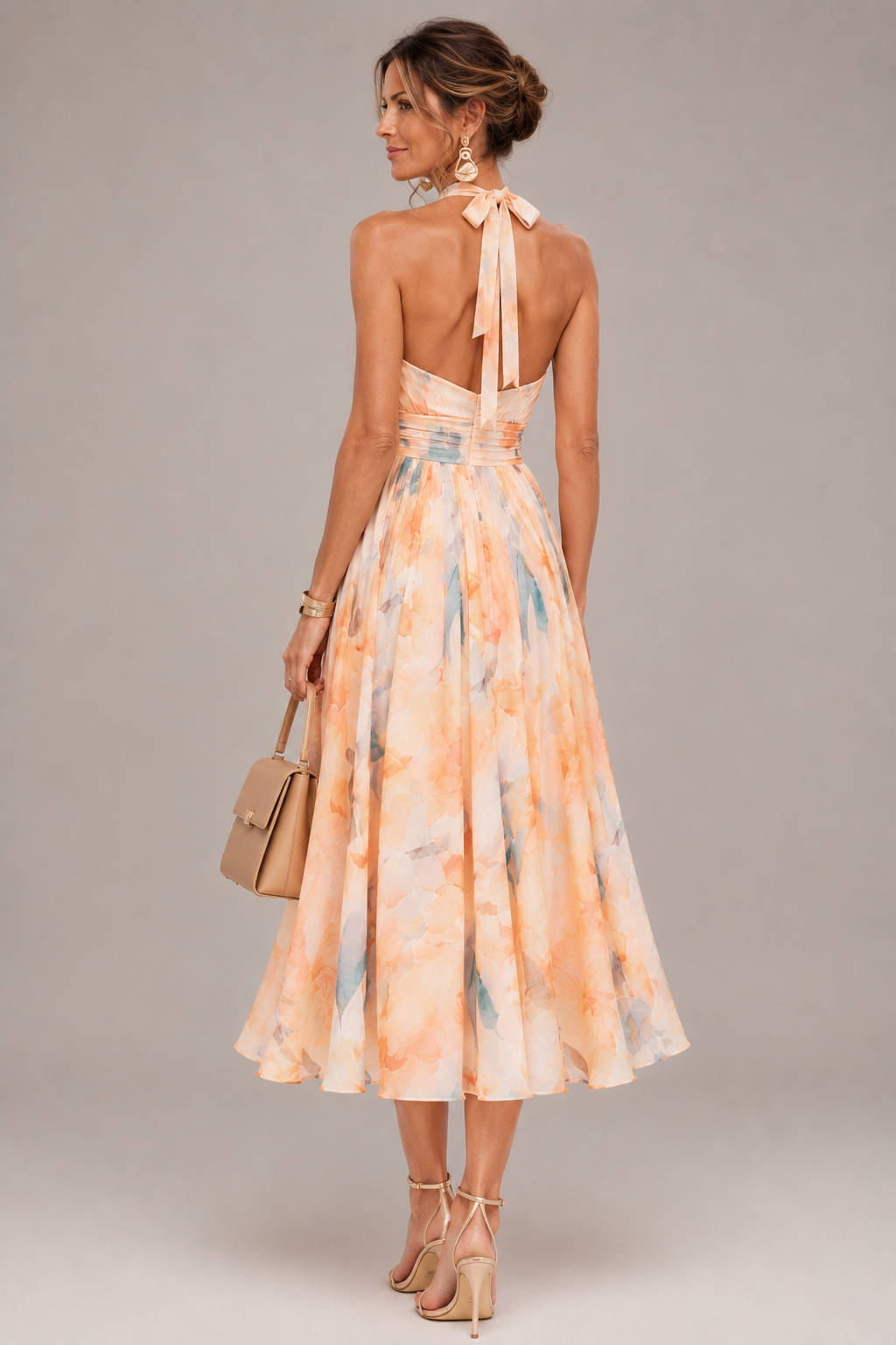 Aurora watercolor halter neck maxi dress, detail of flowing skirt and print