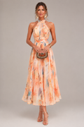 Aurora watercolor halter neck maxi dress in orange floral print, full-length front view