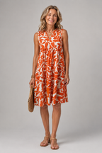 Maaike floral sleeveless midi dress in orange botanical print, front view