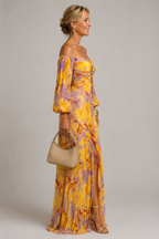 Side view of the Mariel floral maxi dress with front slit