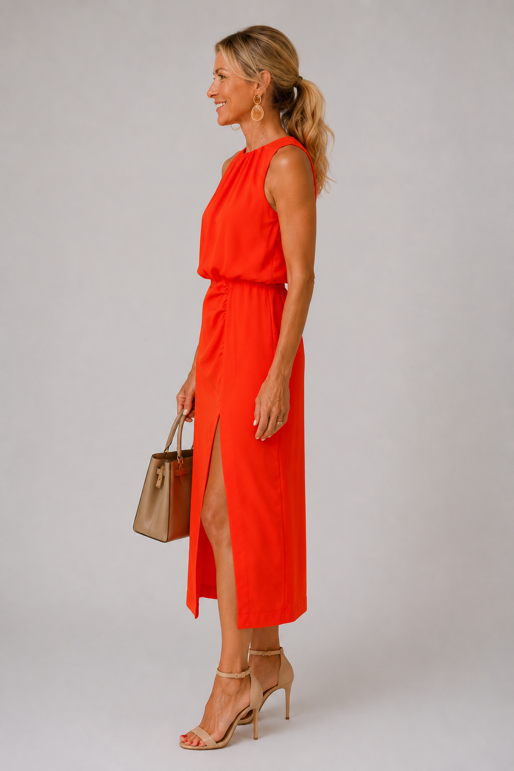 Nikki halter neck slit midi dress in orange, styled view