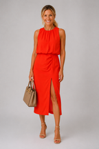 Nikki halter neck slit midi dress in orange, full-length front view