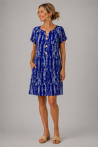 Detail of the Santorini dress batik-style print