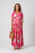 Lone floral maxi dress in pink with V-neck and short puff sleeves, front view