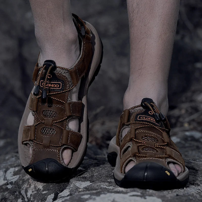 Herbert - Men's Rugged Outdoor Sandals worn on a rocky path